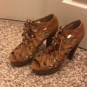 Laced open toed platforms